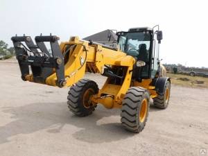 Телескопический погрузчик QUADTRAC WL100T